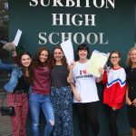 pupils holding exam results