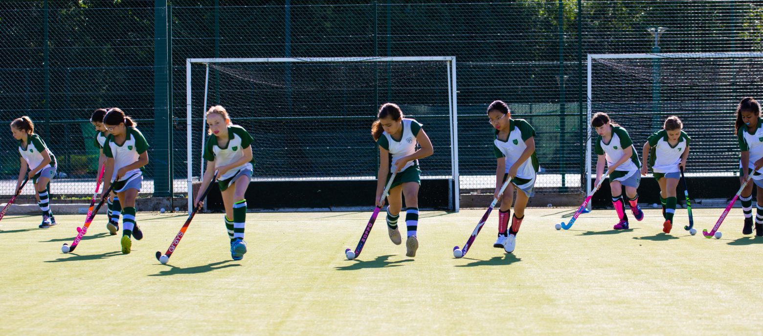 students playing hockey