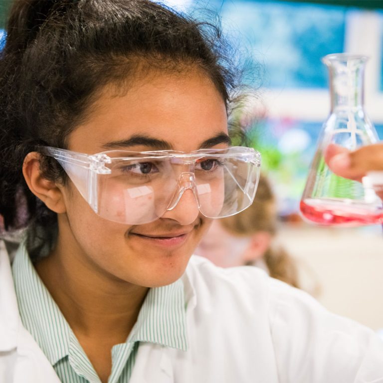 student and conical flask