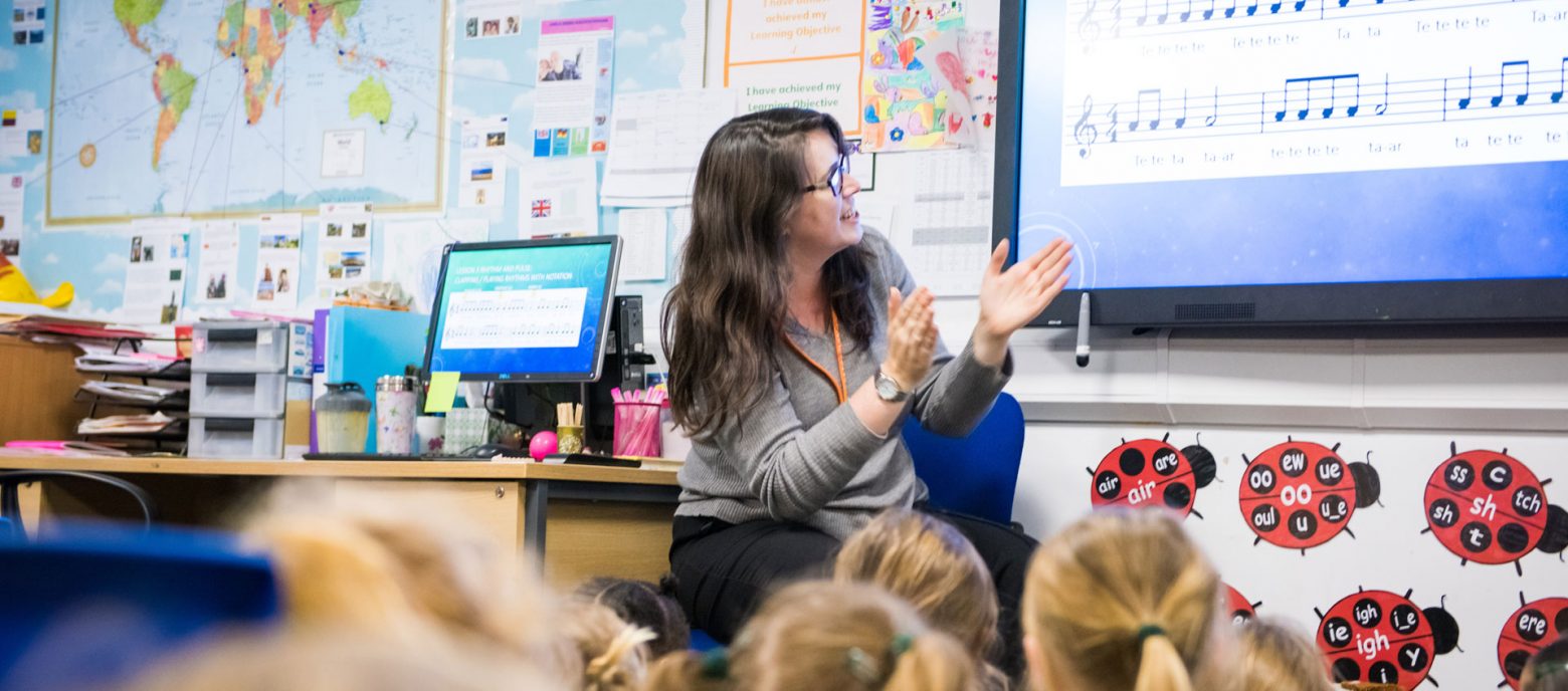 teacher delivering a music lesson