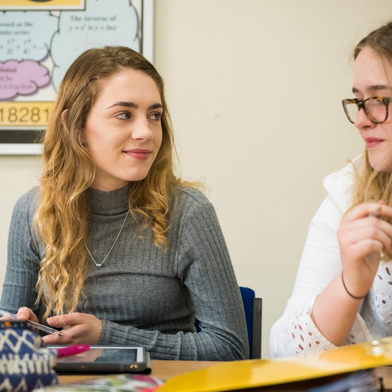 two girls looking at each other