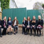 students sat on benches