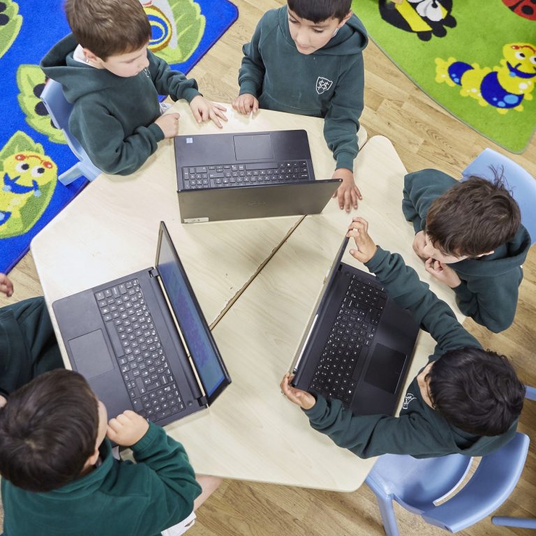 pupils on laptops