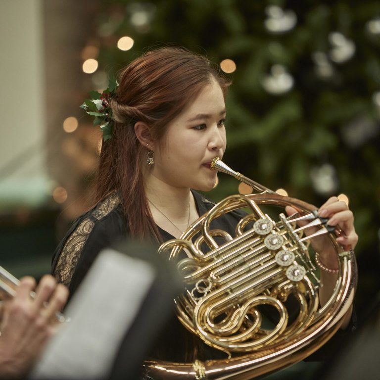 girl playing music