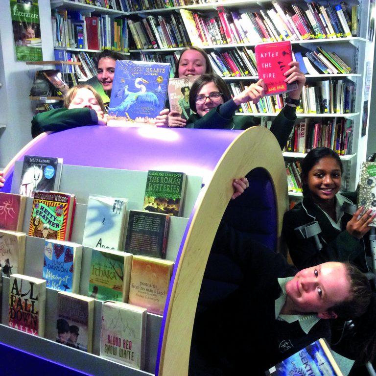 Children holding their favourite books