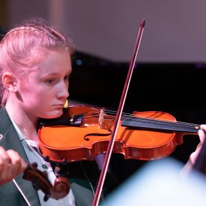 student playing the violin
