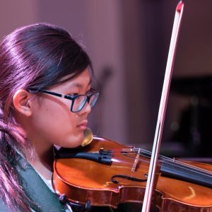 student playing the violin