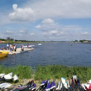 students lining up to go to the rowing boats