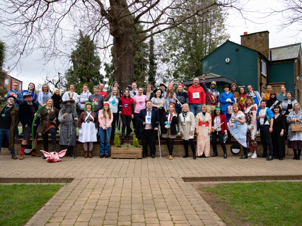 Teachers and staff dressed up in group photo for World Book Day 2023