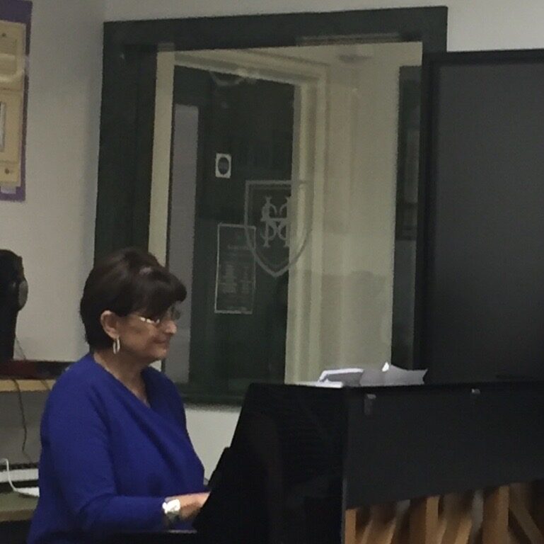 Kathryn Harries playing piano at Surbiton High School