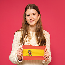 girl holding the spanish flag