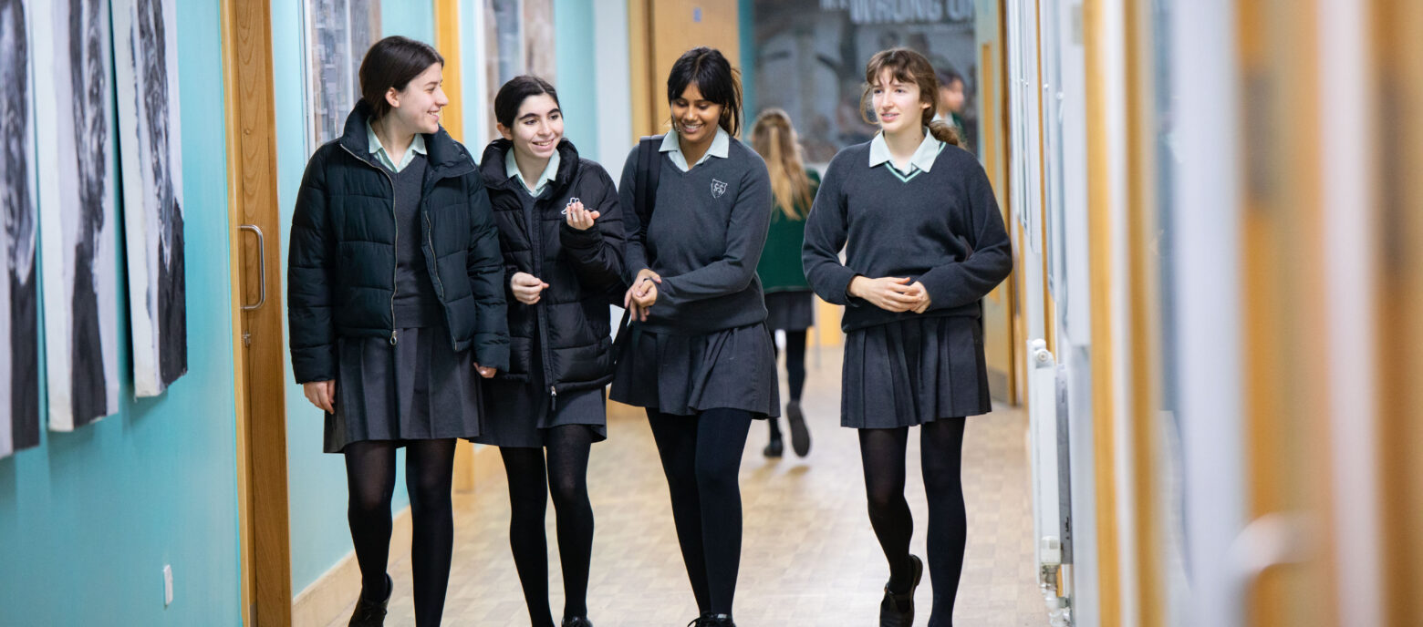 students walking down the corridor