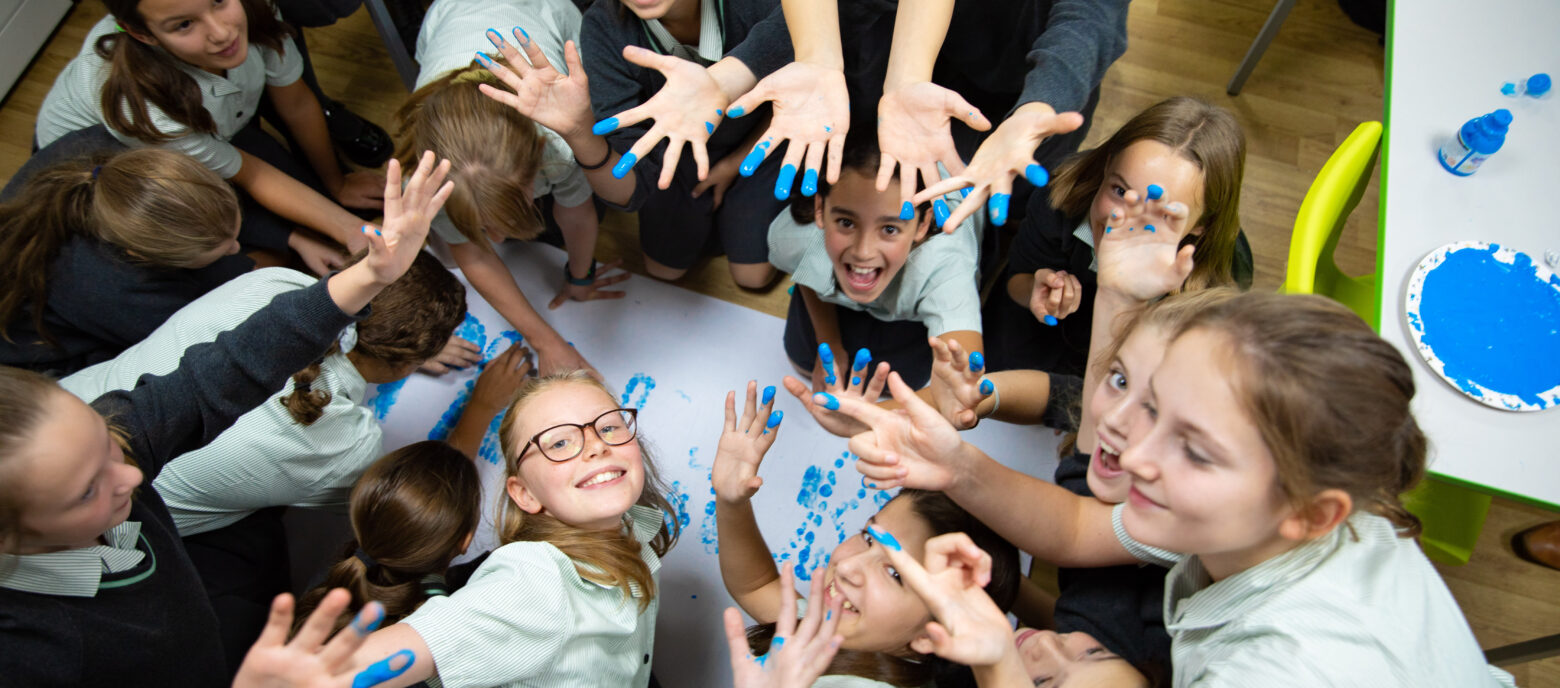 students hand painting