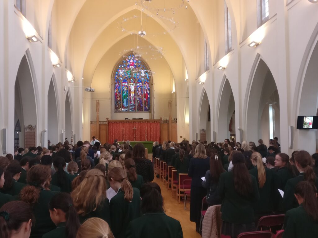 Church hall with the back of pupils