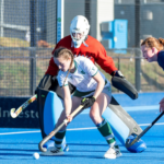 students playing hockey