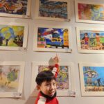 Nathaniel with certificate