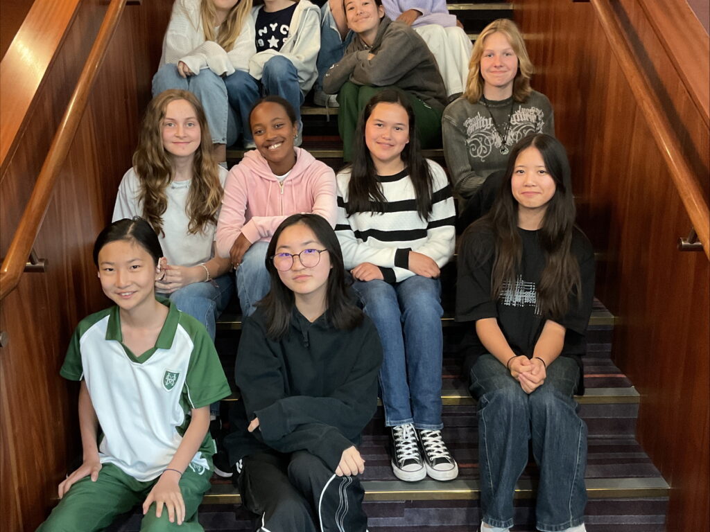 Group of girls sitting on stairs