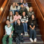 Group of girls sitting on stairs